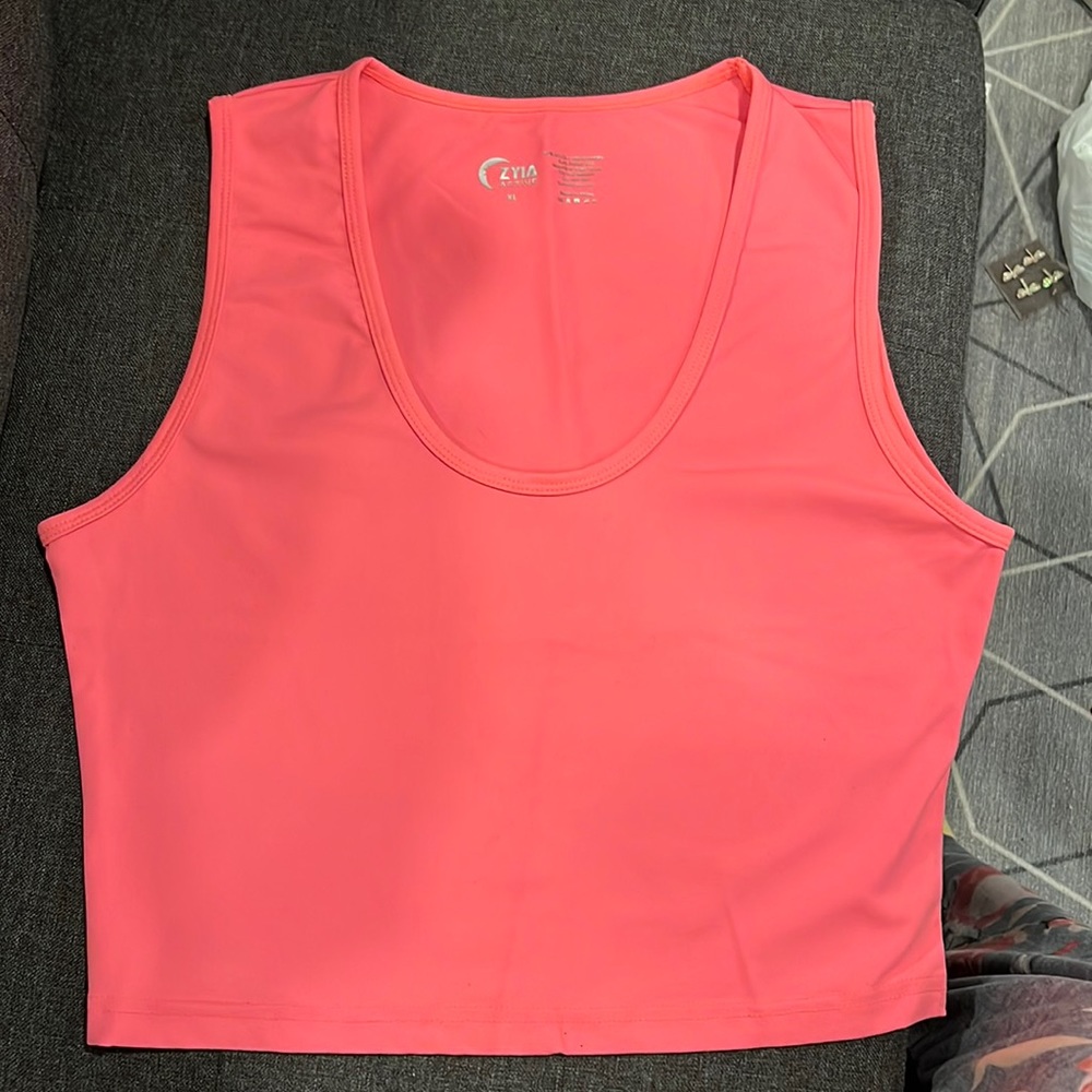 Never worn!  ZYIA half shirt tank.